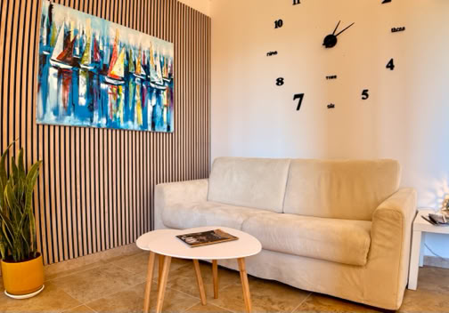 Tela olio + divano Laguna Suite